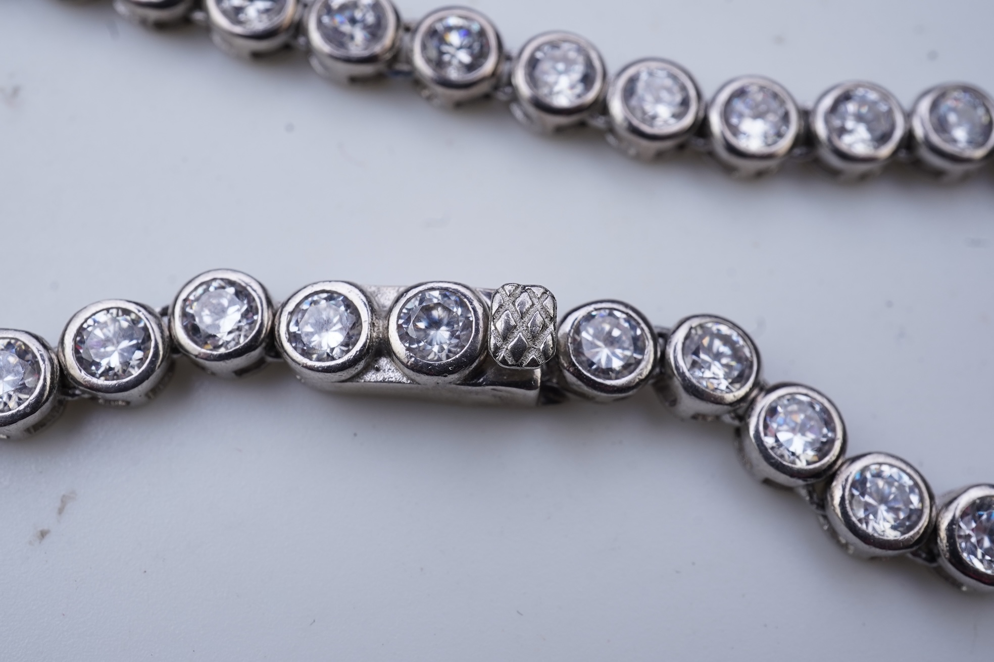A cubic zirconia demi-parure
